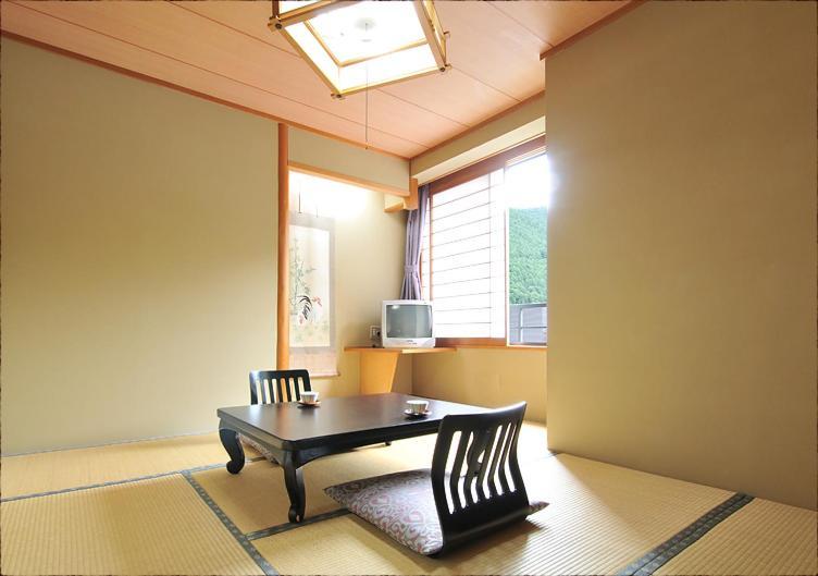 Bouzantei Kotobuki Hotell Ueda Rom bilde